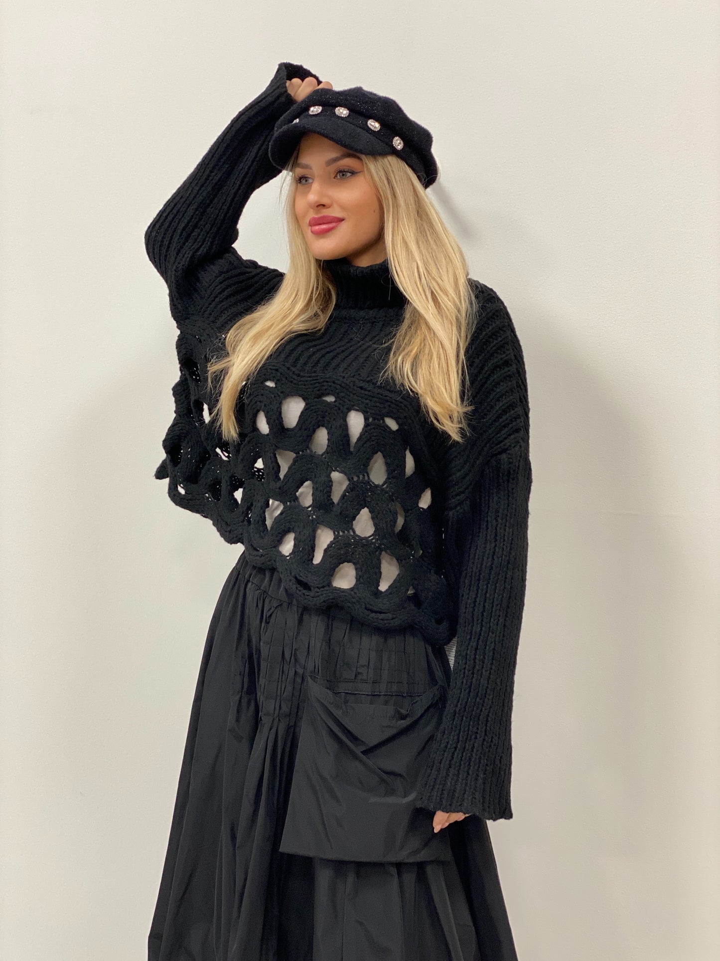 Černý svetr s rolákem